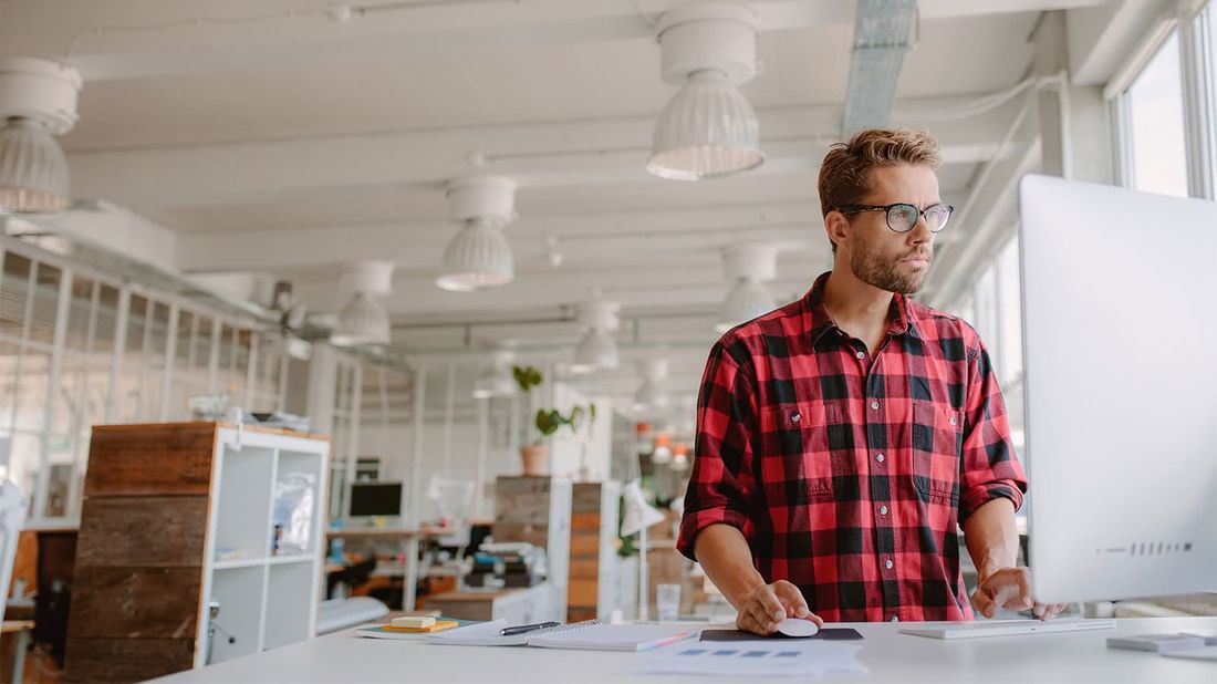 Man at work researching online reputation management