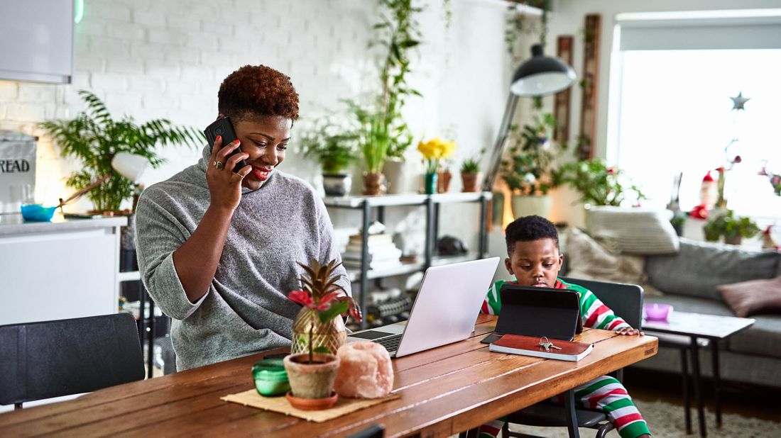 Mom and son working from home for the first time