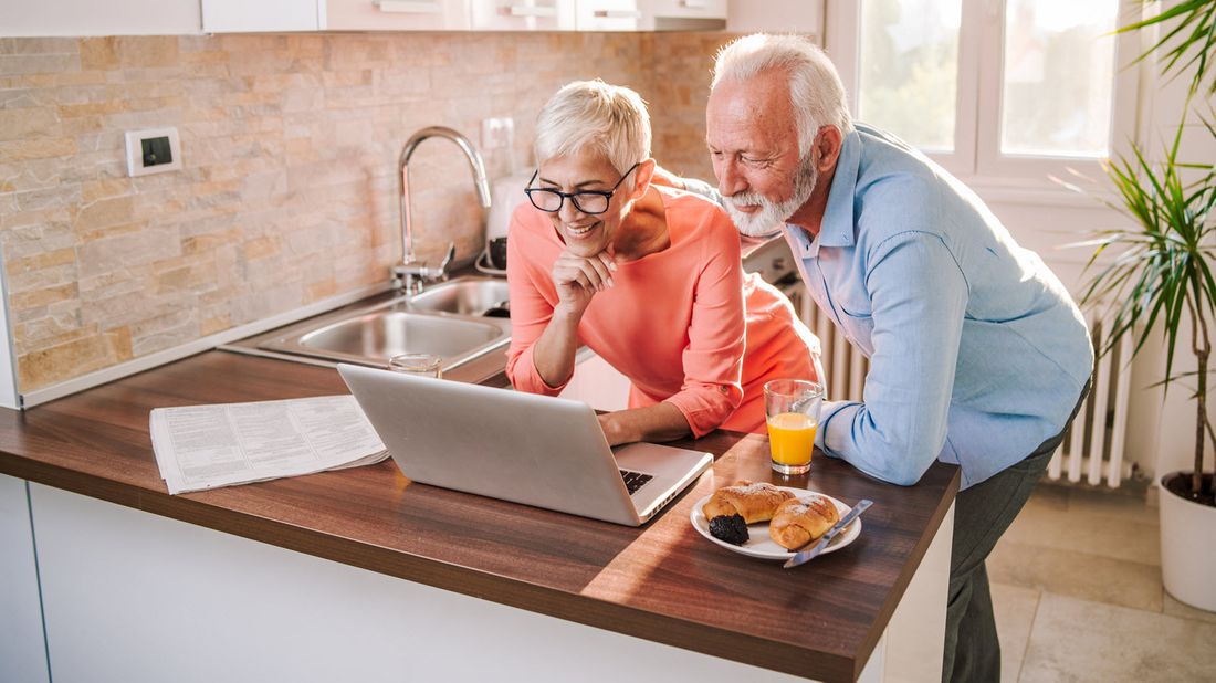 An elderly couple checks their RMD for 2020