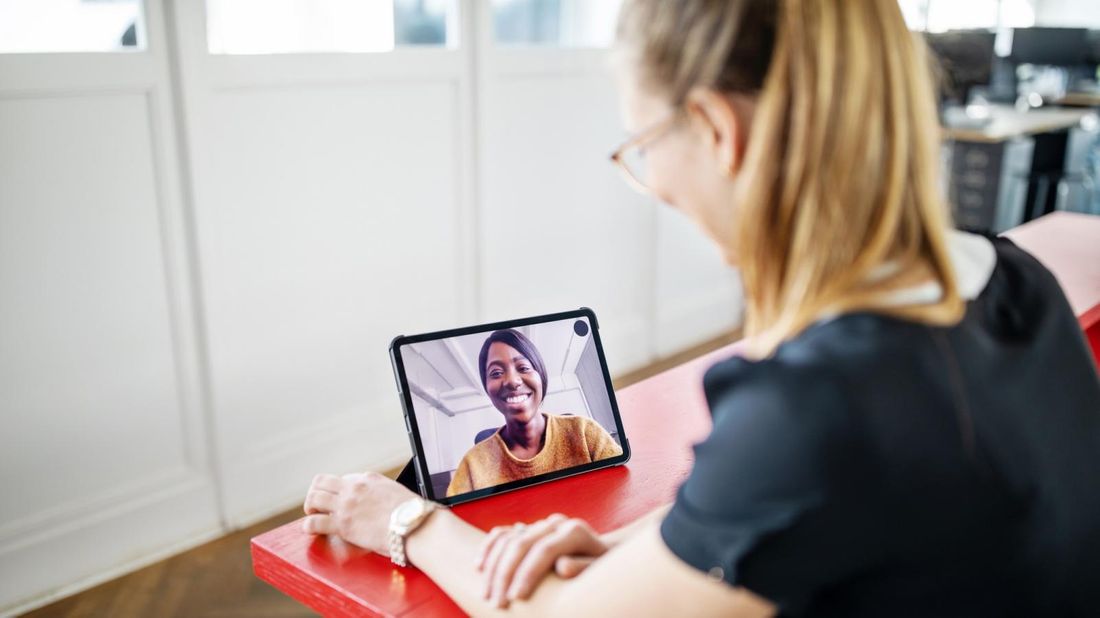 A woman having an online therapy session