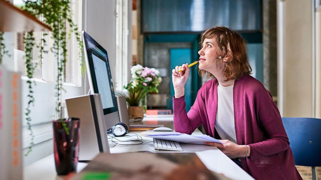  Woman working in upgraded home office