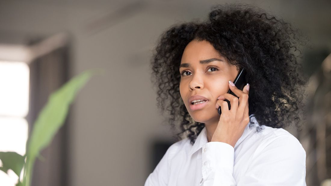 distressed woman on phone