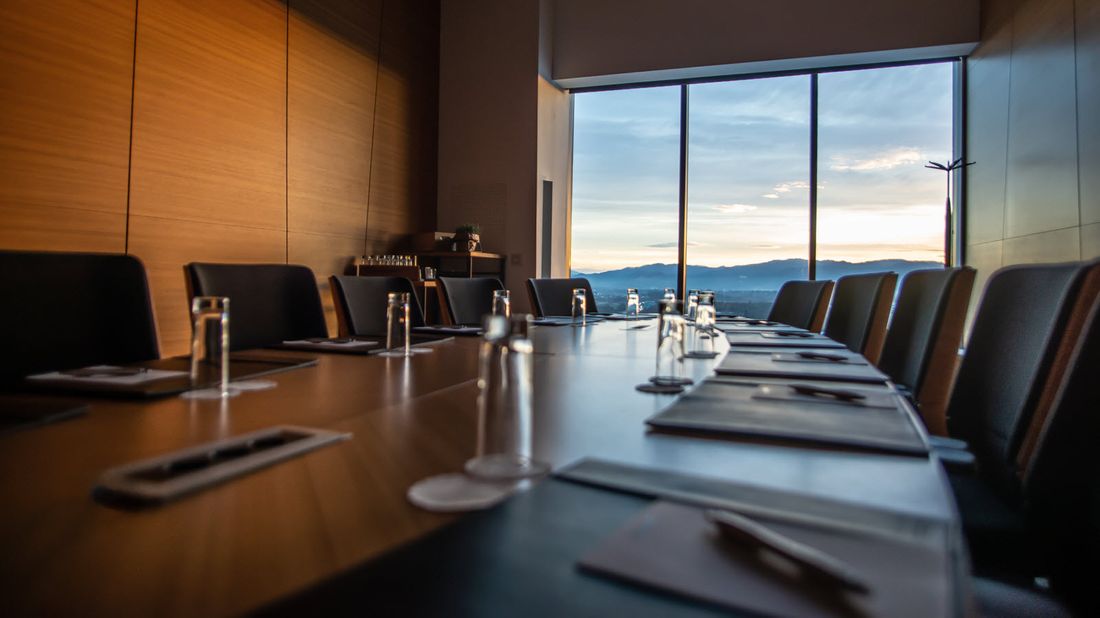 Executive board room overlooking mountains