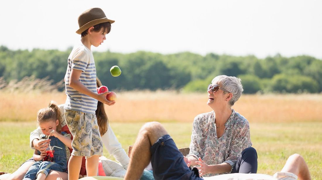 Family having a picnic after learning what a trust fund can do