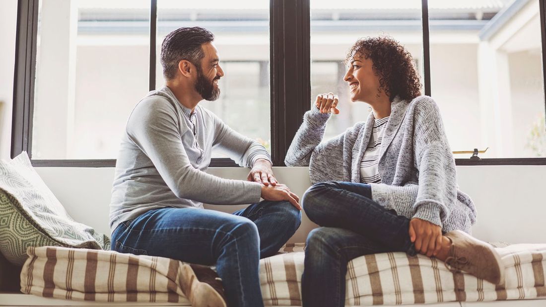 couple discussing what to do with their unspent money