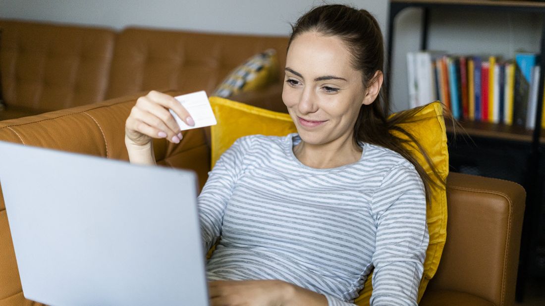 Woman using buy now pay later service to make a purchase