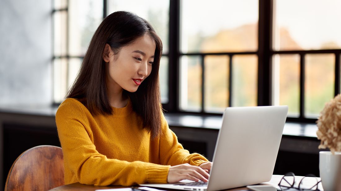 woman working on her laptop