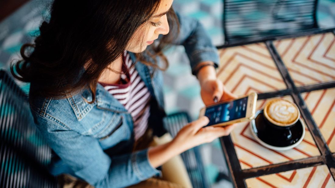 A woman learning about dollar-cost averaging