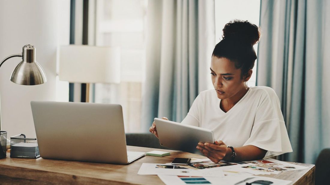 woman overworking from home office