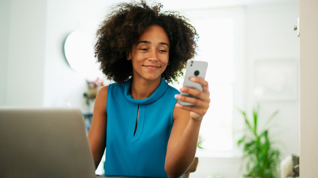 young woman using her mobile bank app