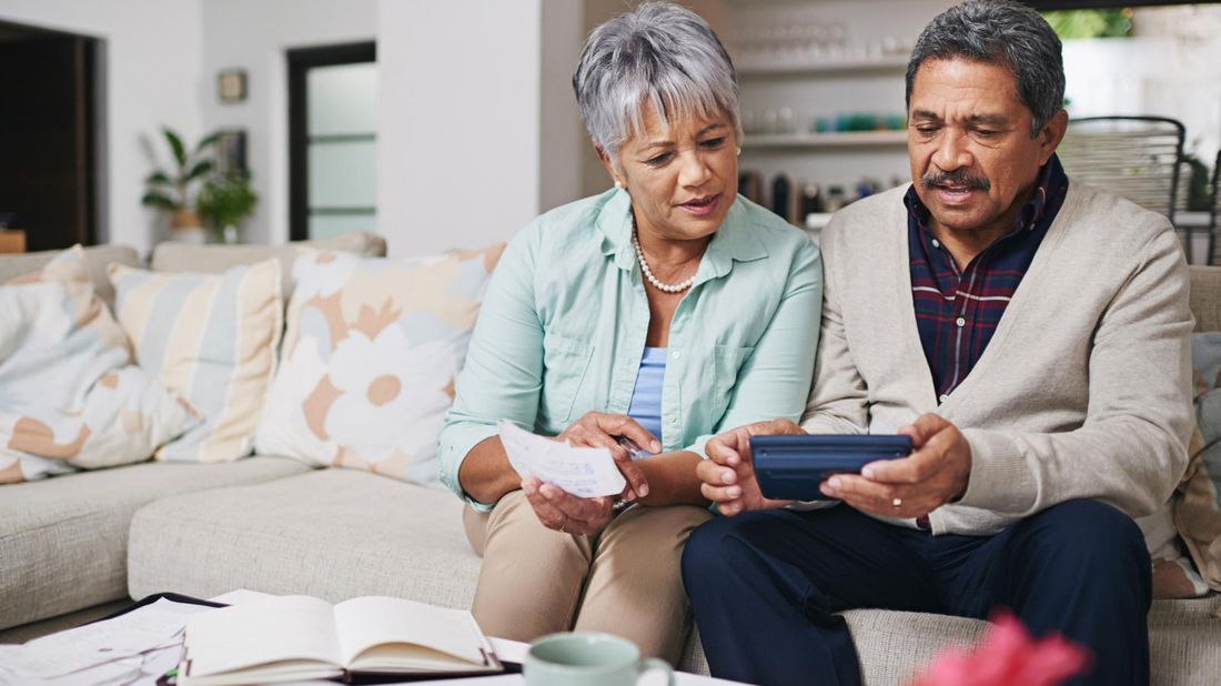 older couple researching annuities