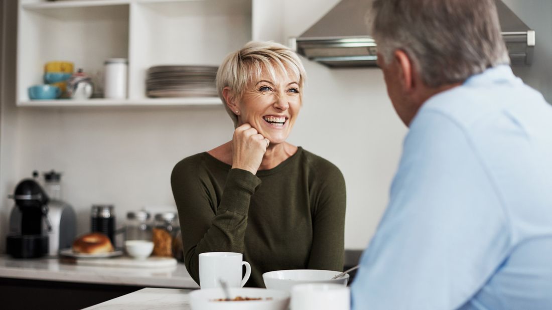 couple discussing retirement over breakfast