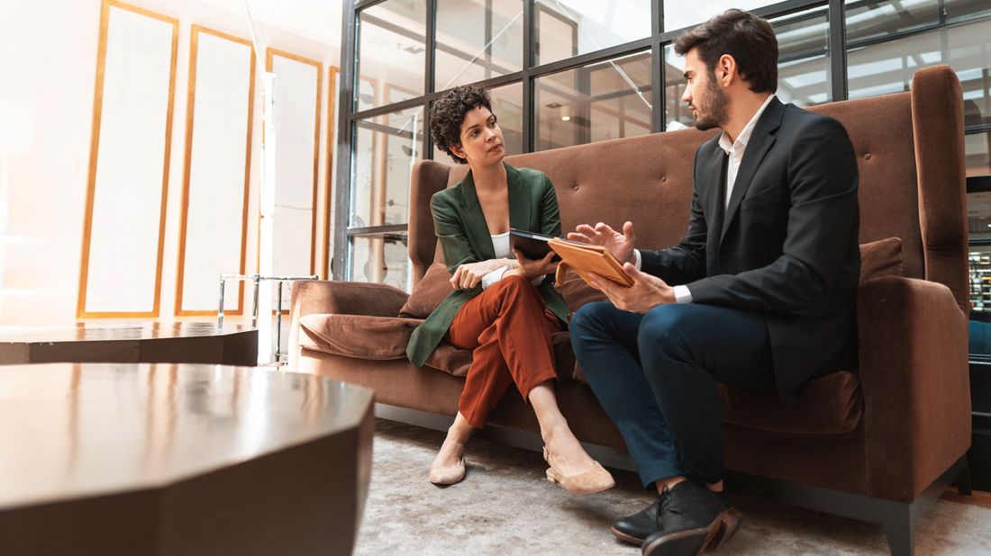 A woman meeting with her wealth  manager