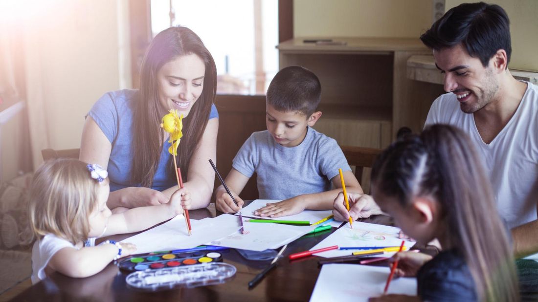 Family drawing together after receiving child tax credit payment