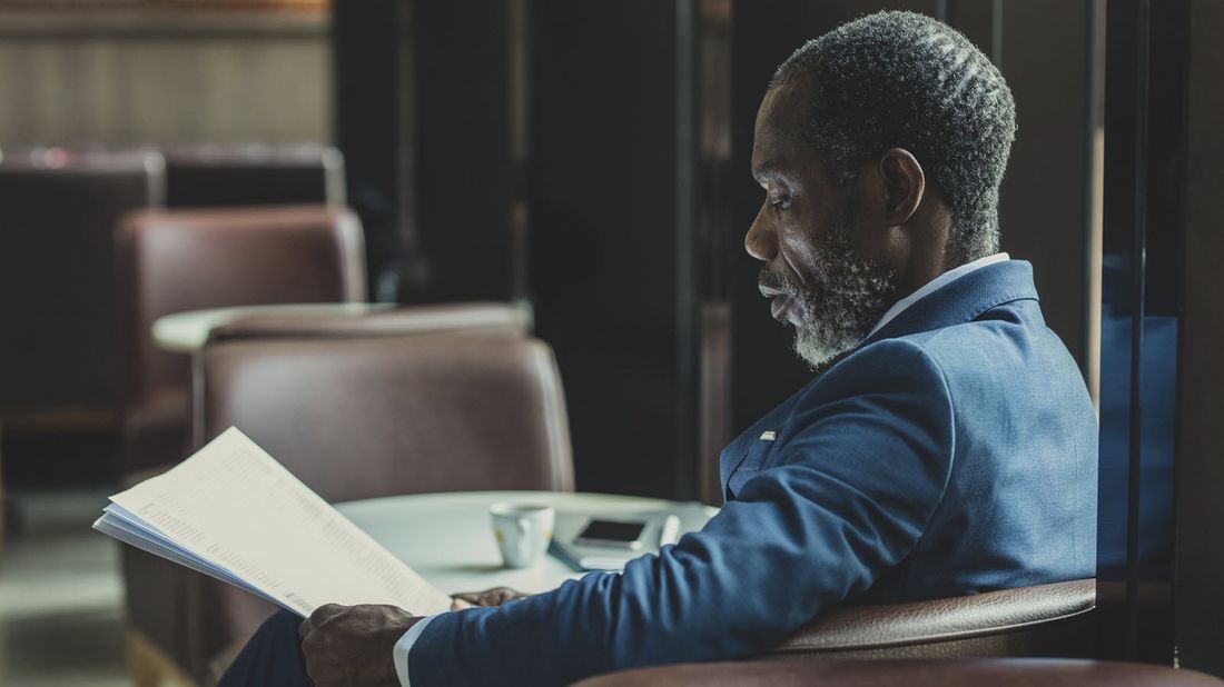 Man reading Northwestern Mutual Market Commentary