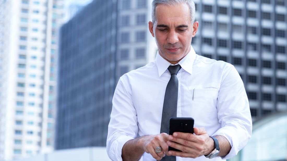 man reviewing his stock investments