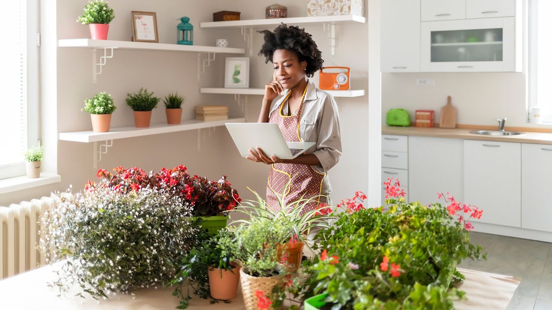 woman working on her gardening side business