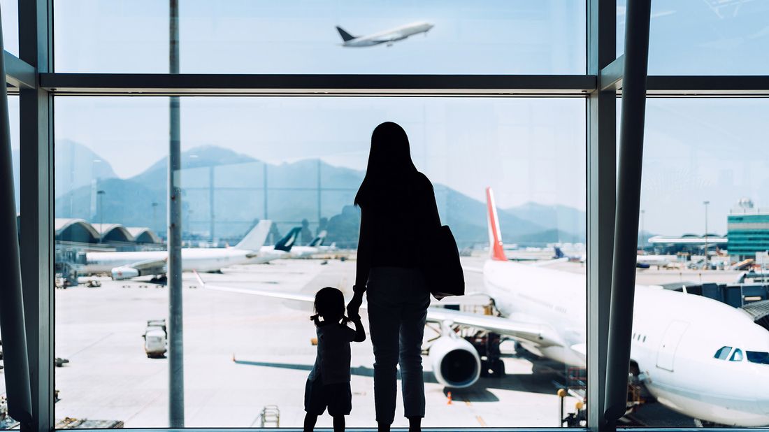 Mom and daughter traveling for holidays