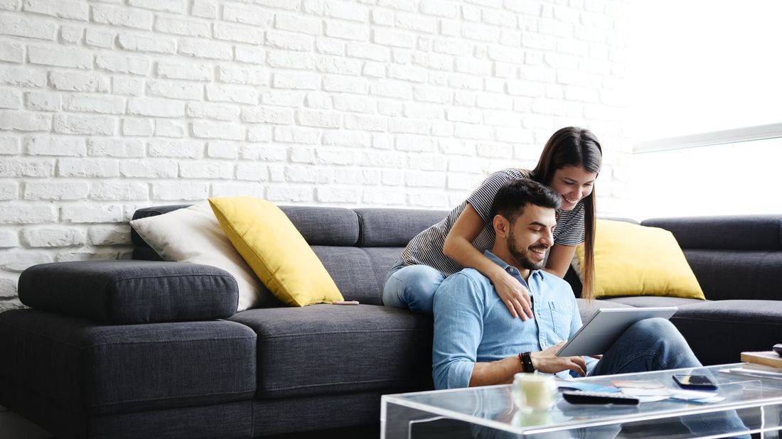 Couple researching life insurance premium costs