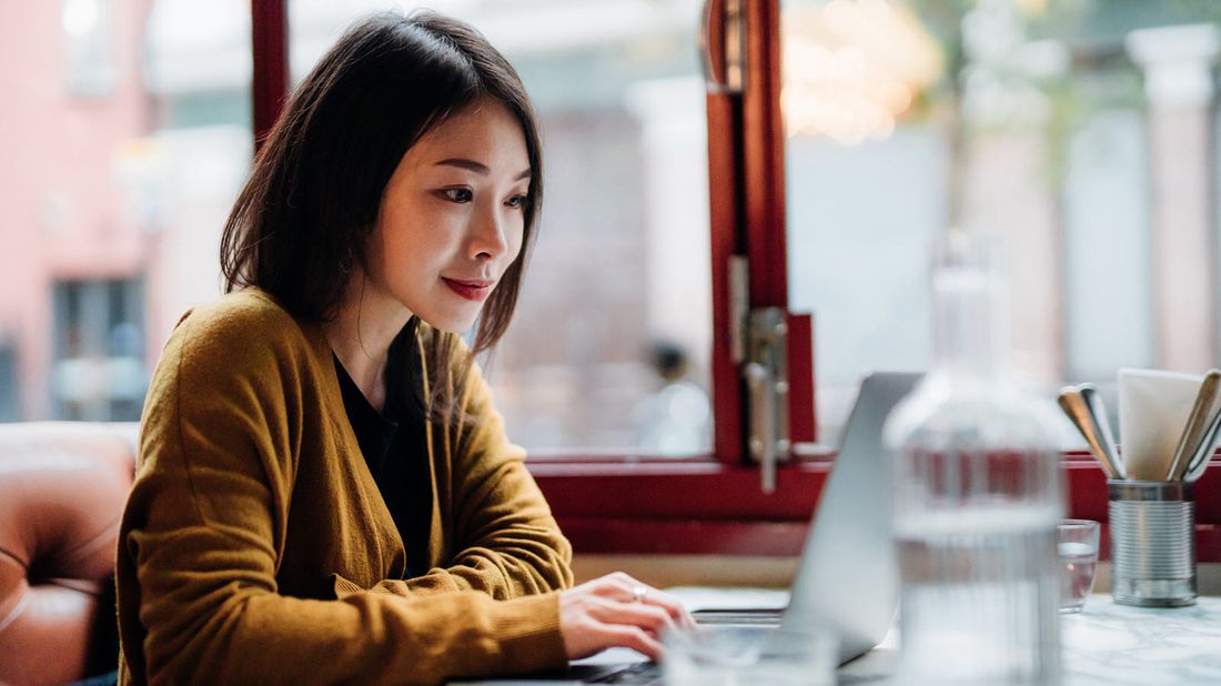 Young woman studying diversification in investing