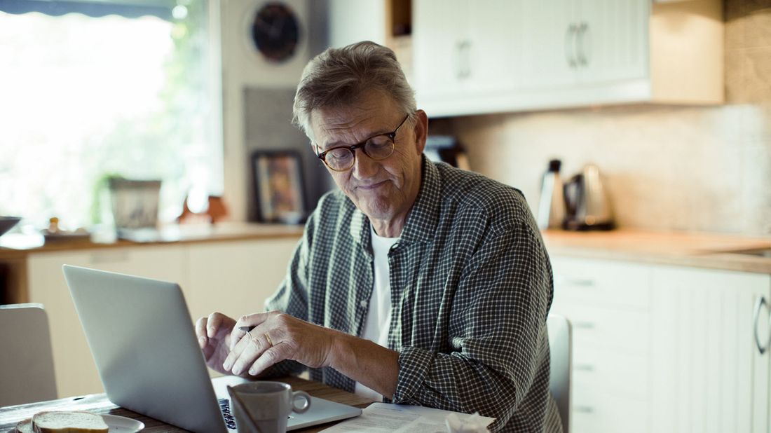 Man reading Northwestern Mutual Market Commentary