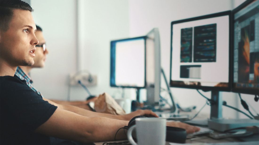 Man in an office wondering what happens to benefits when he leaves a job