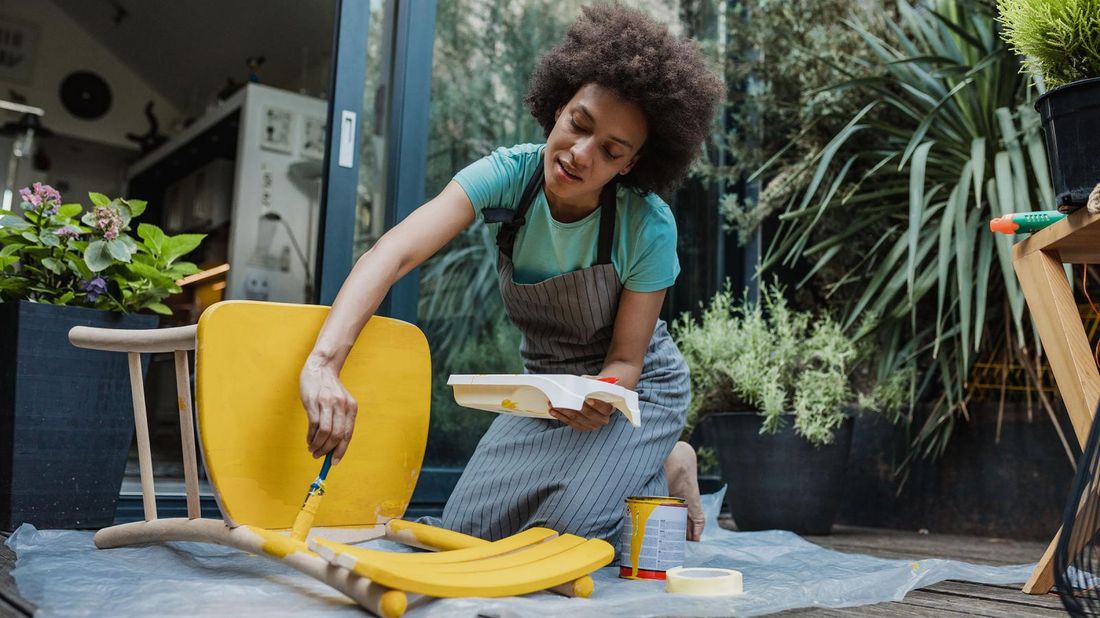 woman-painting-chair-April-buy-skip