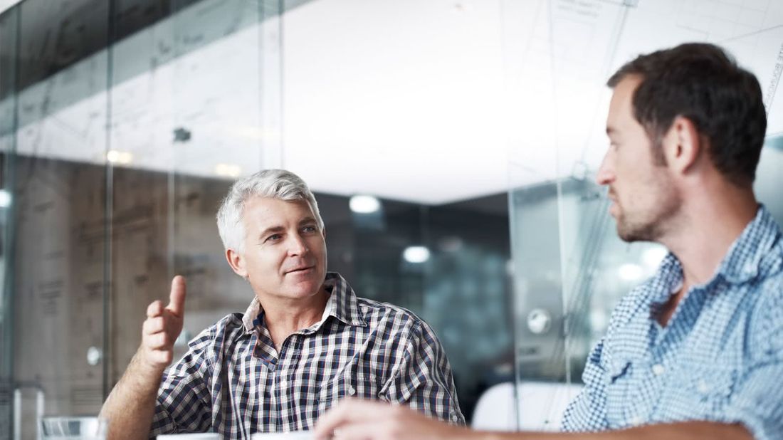 Coworkers talking about things you should know before co-signing for a child