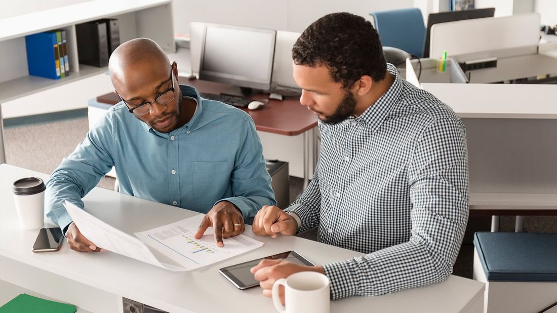 Business owners looking over the tax law changes