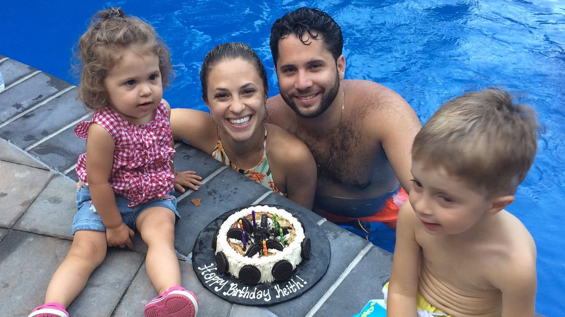 Family playing in their DIY backyard pool