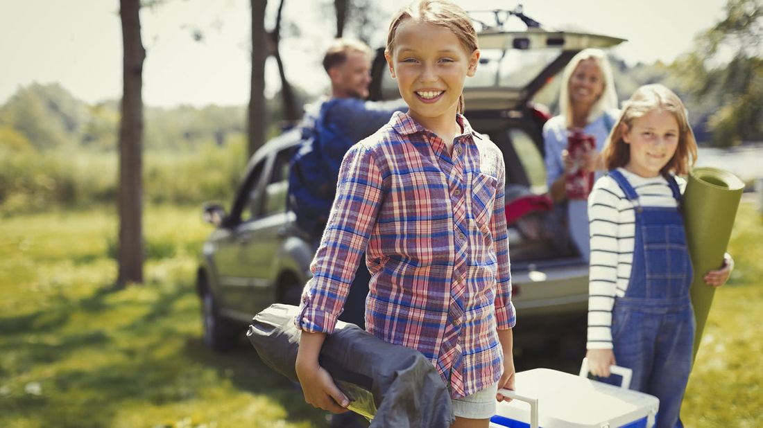 Family getting ready for camping.