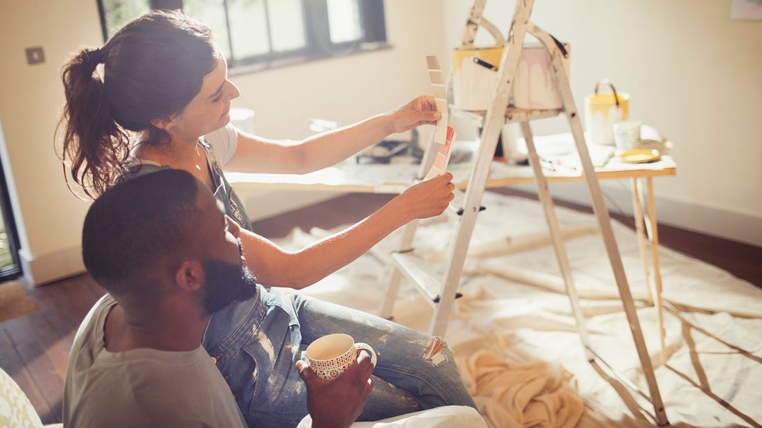 couple looking at paint swatches