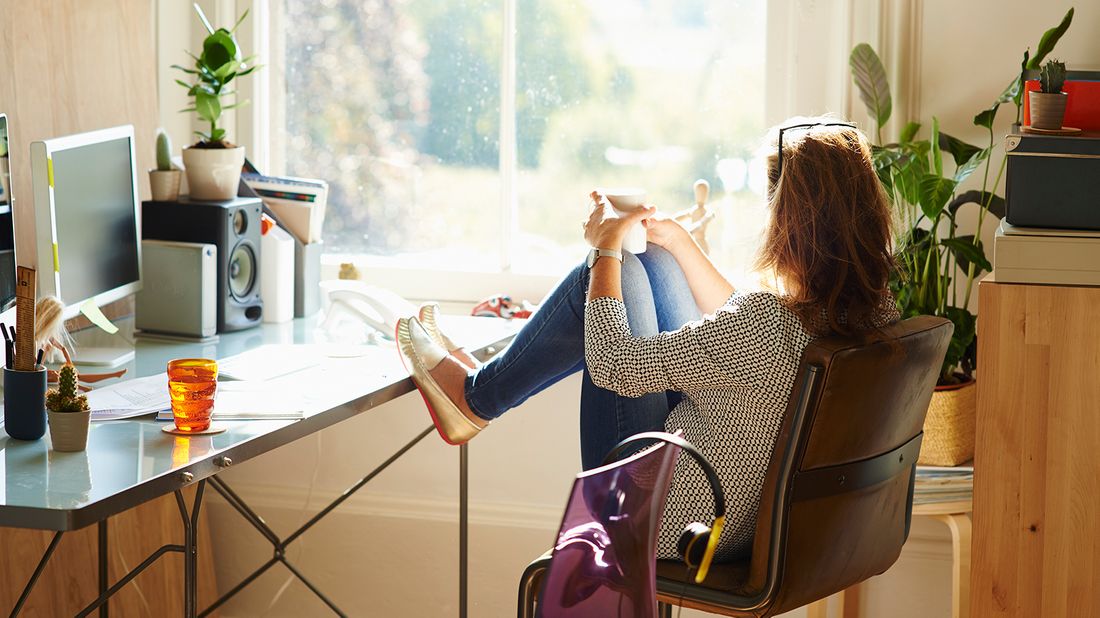 Woman at a desk.