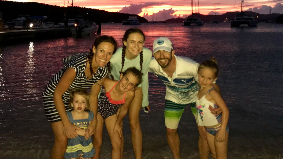 Royce Zimmerman with his family on the beach.