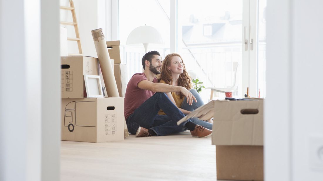 Couple in their new home.