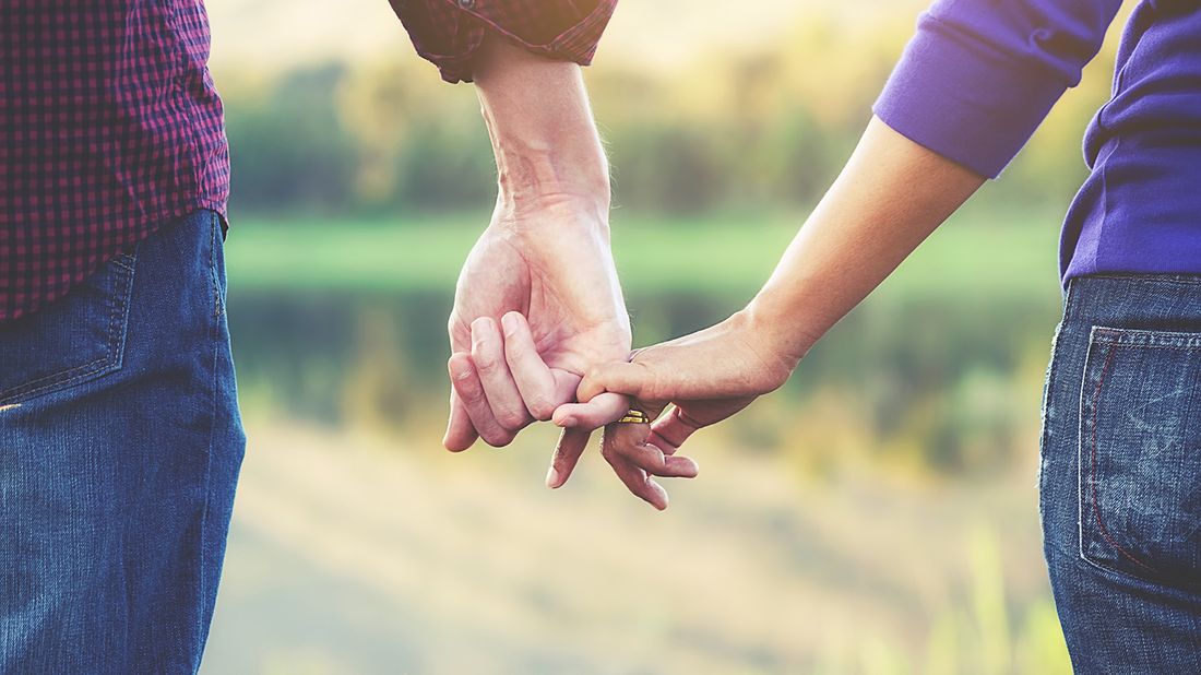 couple holding hands