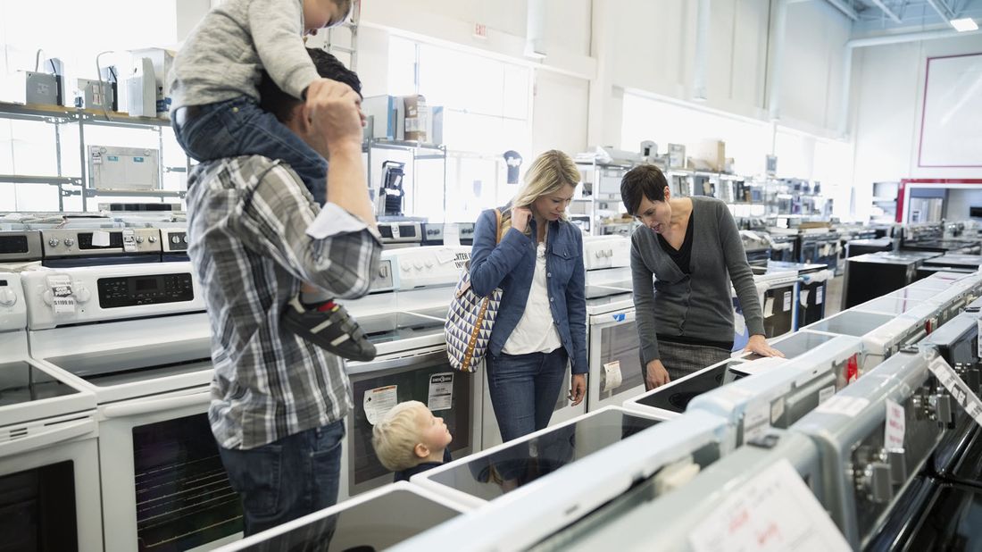 Family shopping for appliances.