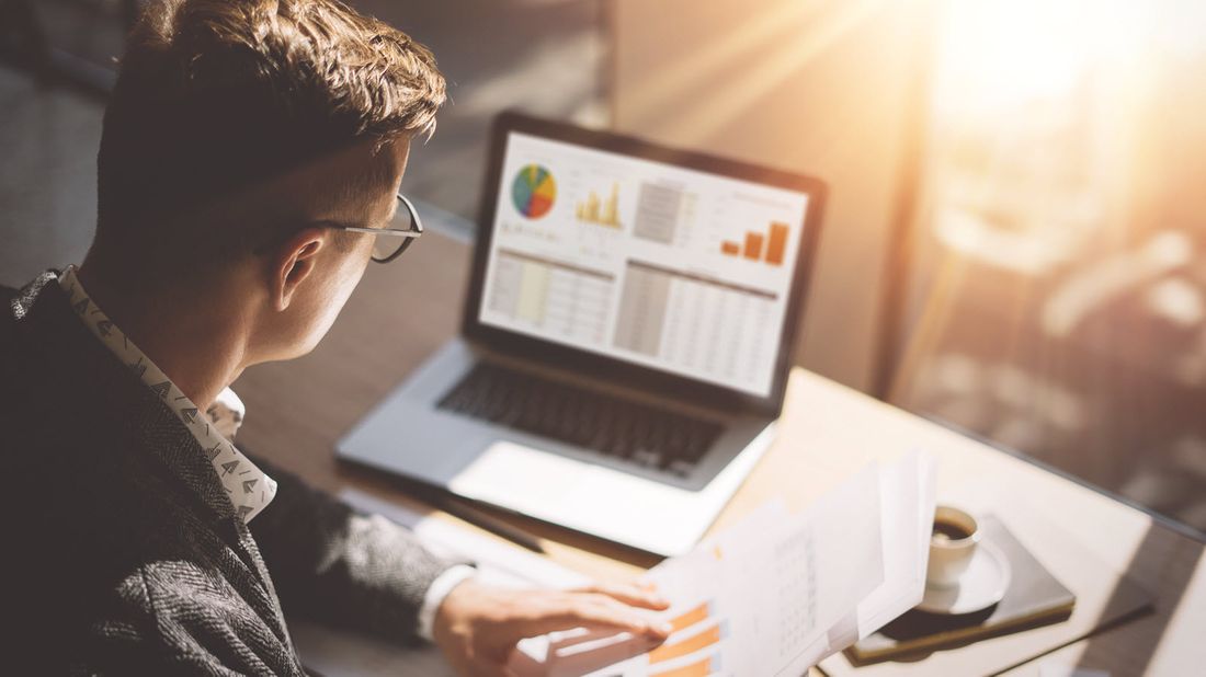 Man looking at his complete financial picture.