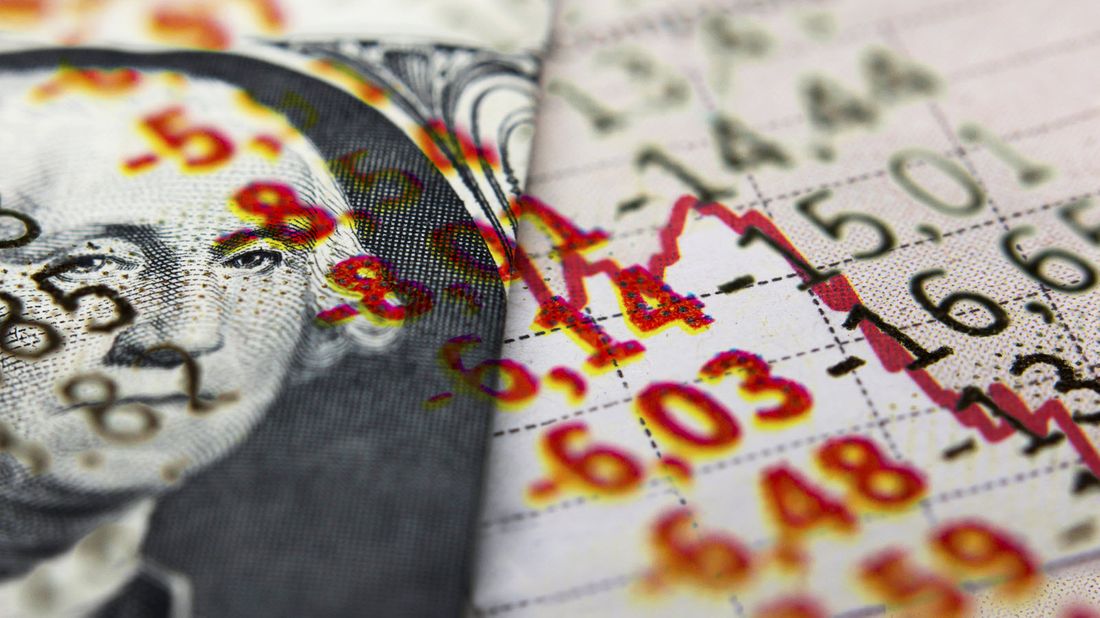 U.S. currency alongside financial figures.