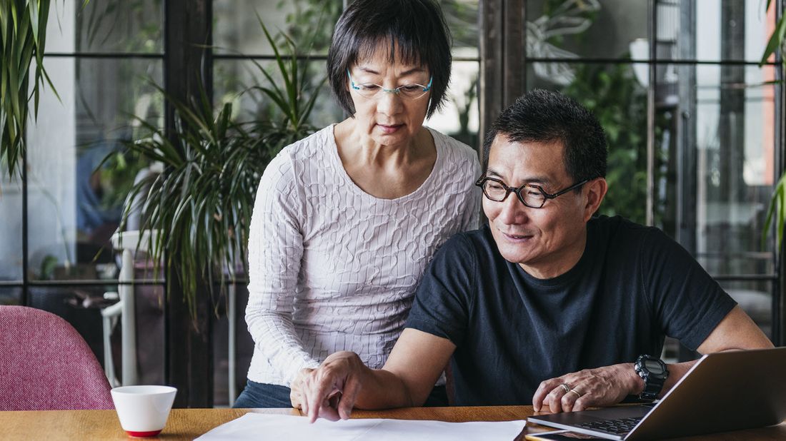 Husband and wife discussing required minimum distributions.