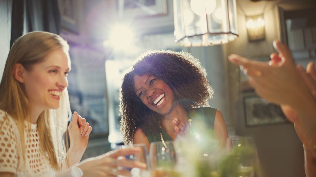 Women having drinks at a bar.