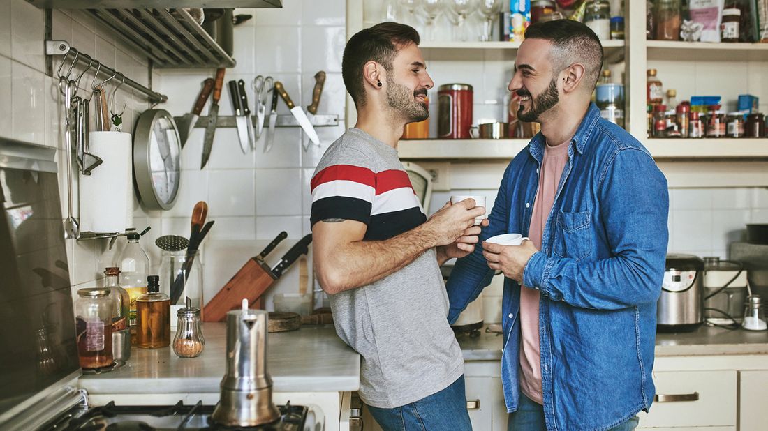 couple discussing money differences it kitchen