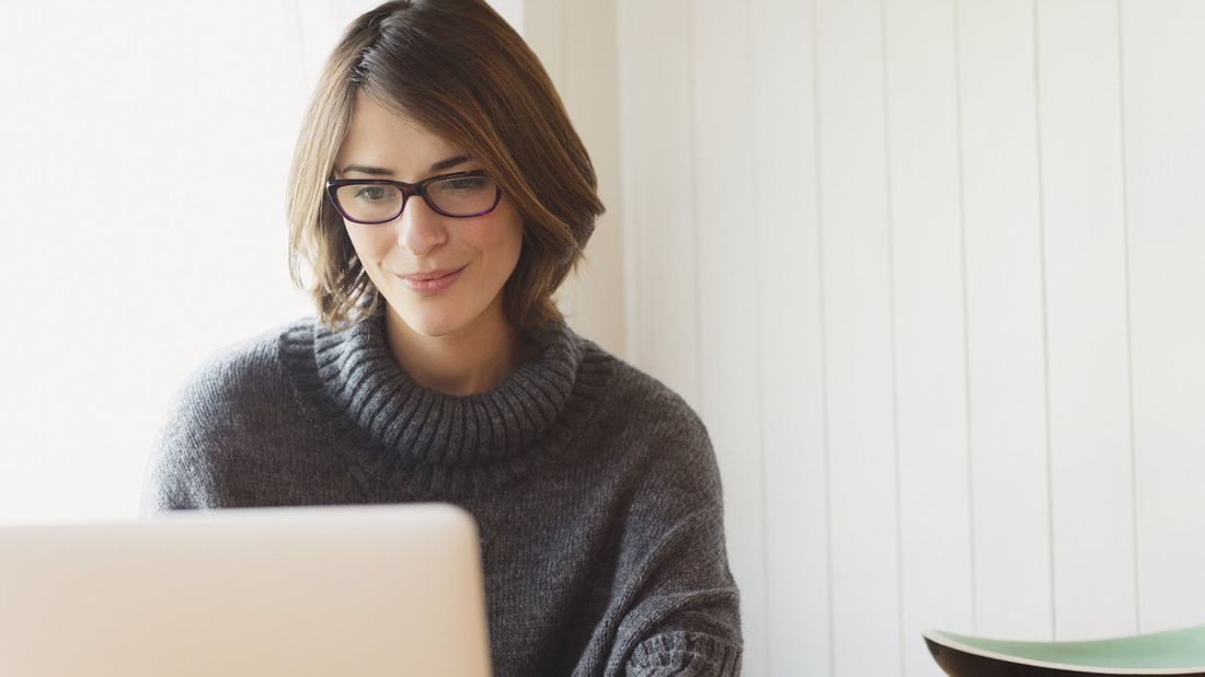 A woman viewing her accounts online