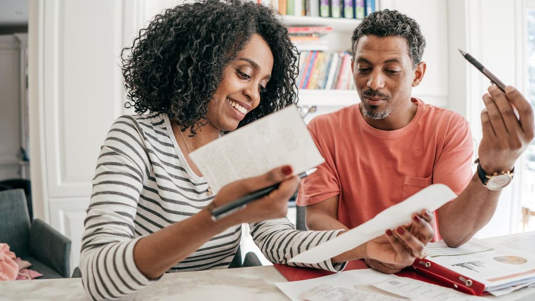 Couple trying to figure out their taxes.