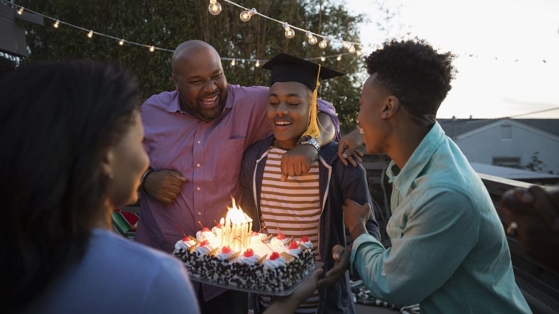 Family celebrating a high school graduation. 