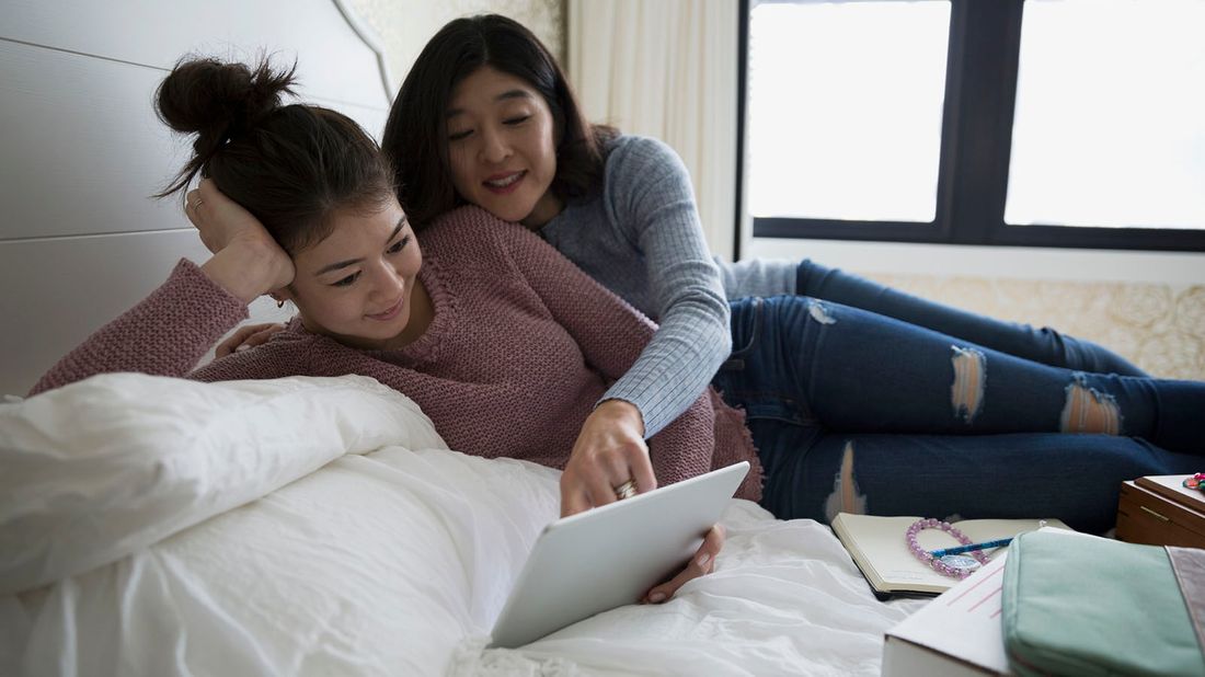 mother and daughter talking college finances