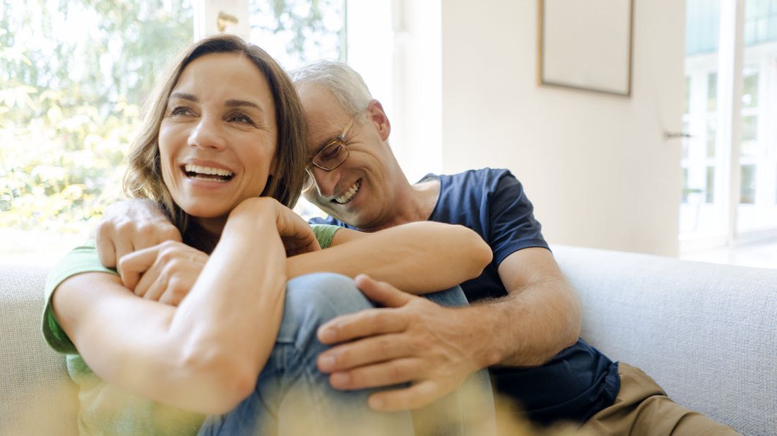 Couple at home considering what is an example of an annuity.