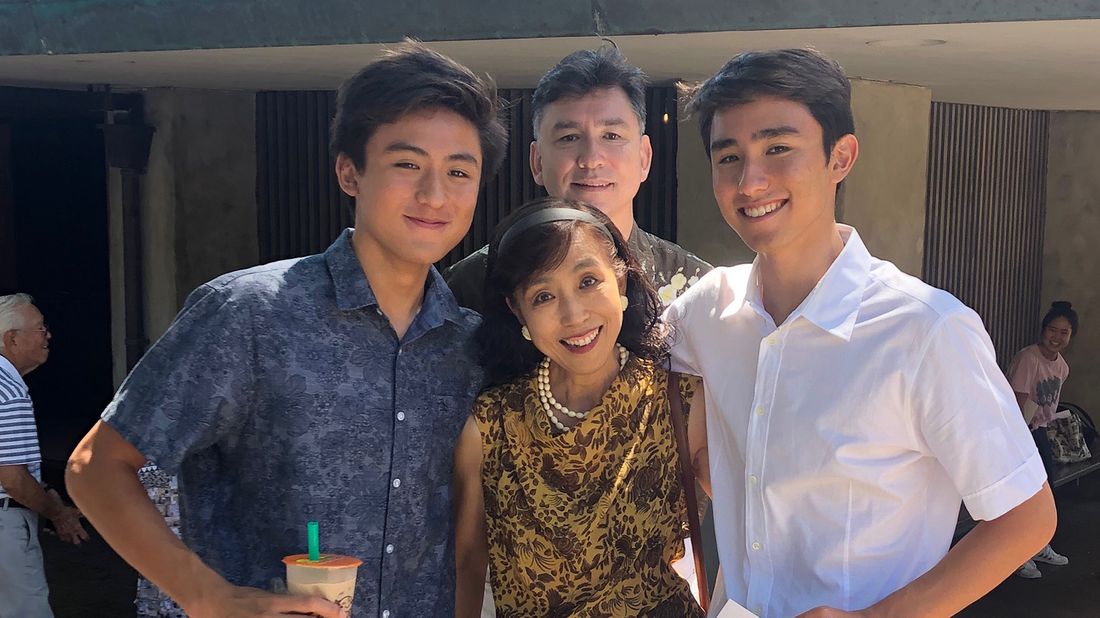 Akiko Sakamoto with her twin sons, Tyler and Ray, and husband, Gen.