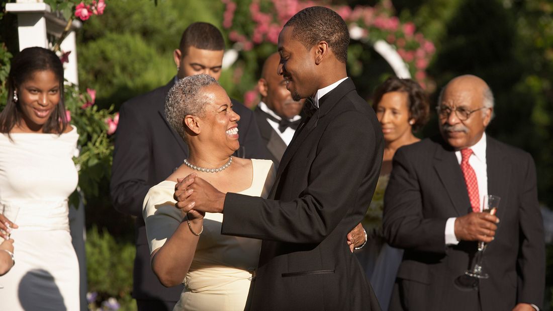 mother and son dancing at wedding 