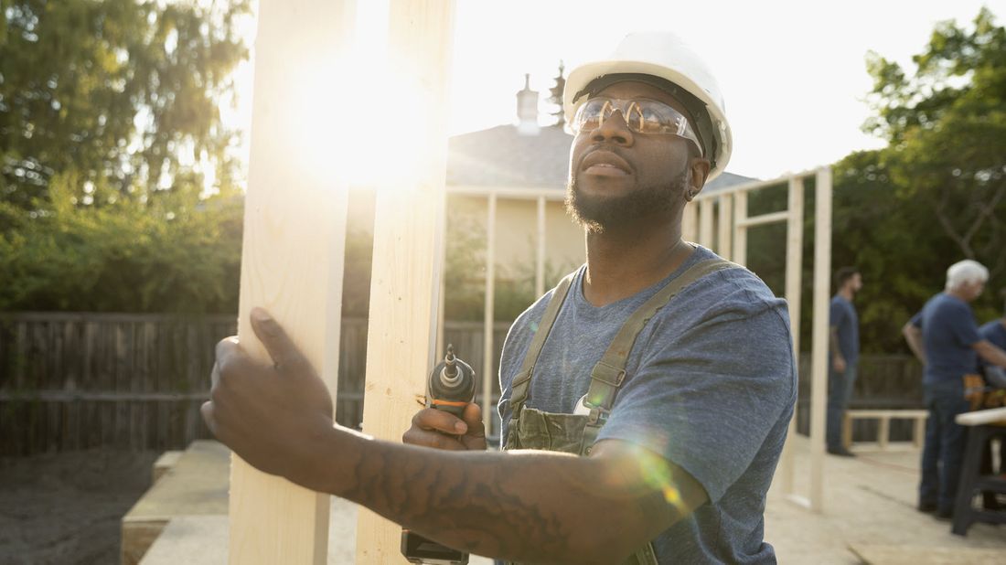 Man building a home.